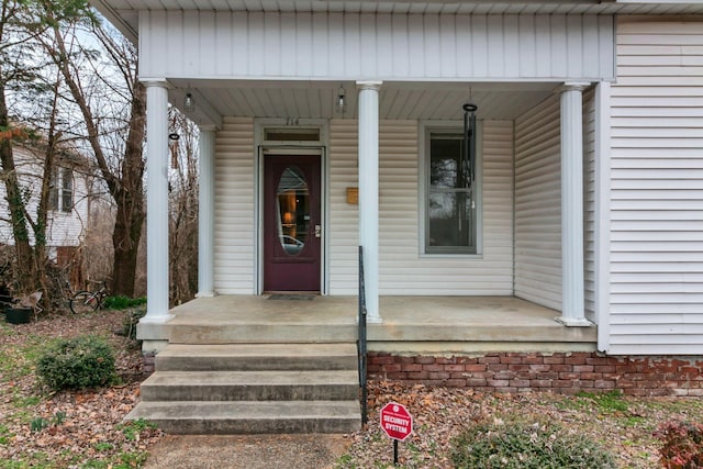 doorway to property featuring a porch