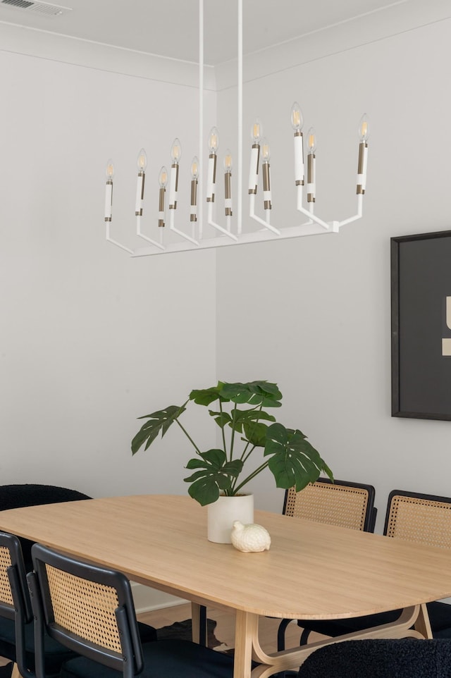 dining area featuring ornamental molding