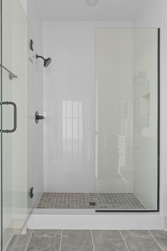 full bath featuring a stall shower