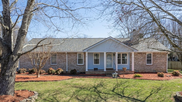 single story home with crawl space, brick siding, and a chimney