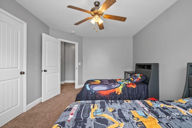 bedroom featuring carpet flooring, ceiling fan, and baseboards