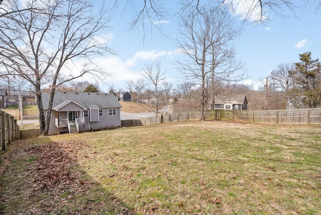 view of yard with a fenced backyard