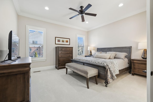 bedroom with recessed lighting, visible vents, ornamental molding, light carpet, and baseboards