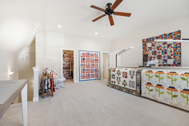 carpeted bedroom with a ceiling fan and recessed lighting