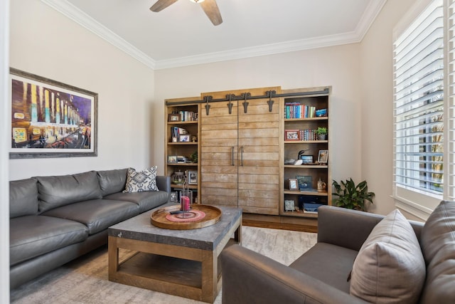 living room featuring ceiling fan and ornamental molding