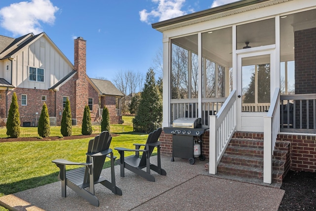 view of patio featuring a grill and a sunroom