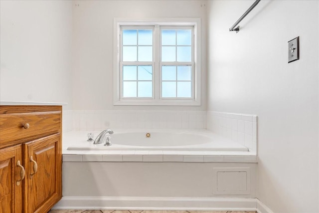 bathroom with a garden tub