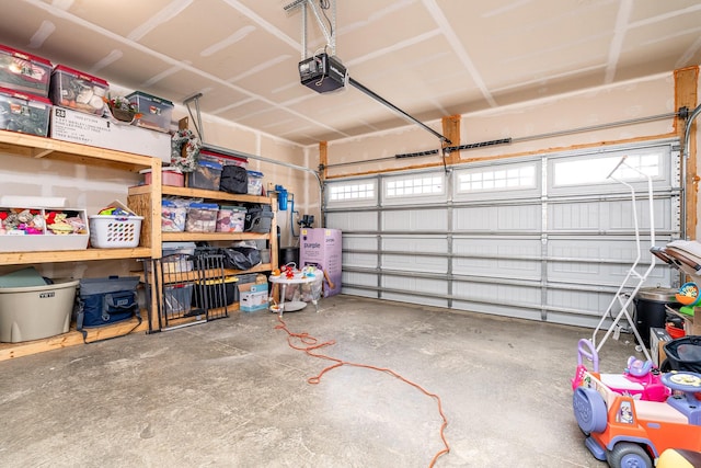 garage featuring a garage door opener