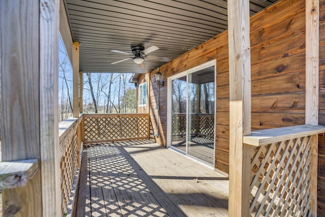 wooden terrace with ceiling fan