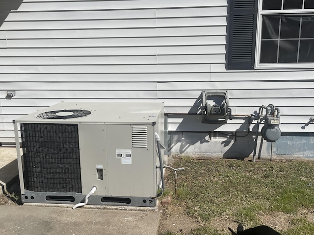 details featuring gas meter and central AC unit