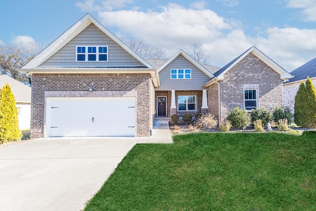 craftsman-style home with a garage, a front yard, concrete driveway, and brick siding