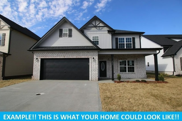 view of front of home featuring a garage, a front lawn, brick siding, and driveway