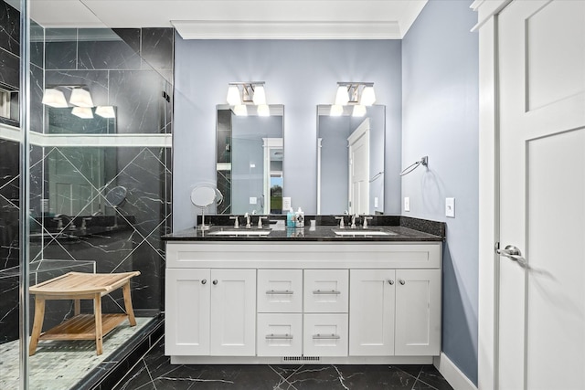 full bathroom with marble finish floor, double vanity, a sink, and a shower stall