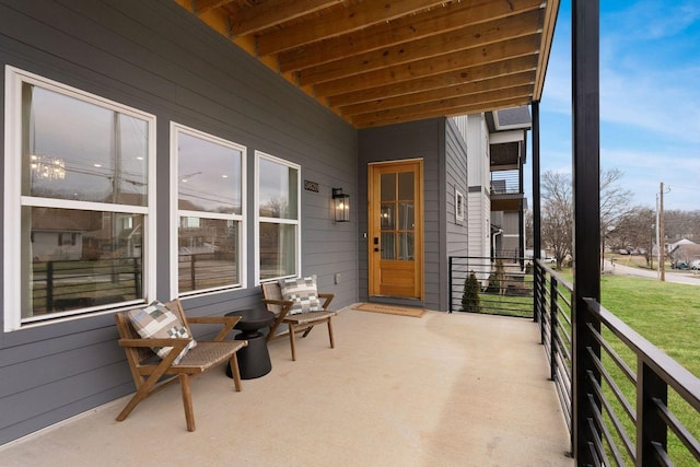 view of patio / terrace featuring a balcony