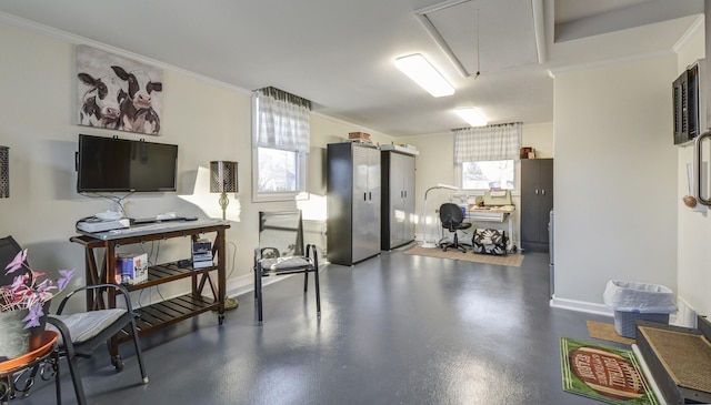 interior space featuring ornamental molding, a wealth of natural light, and attic access