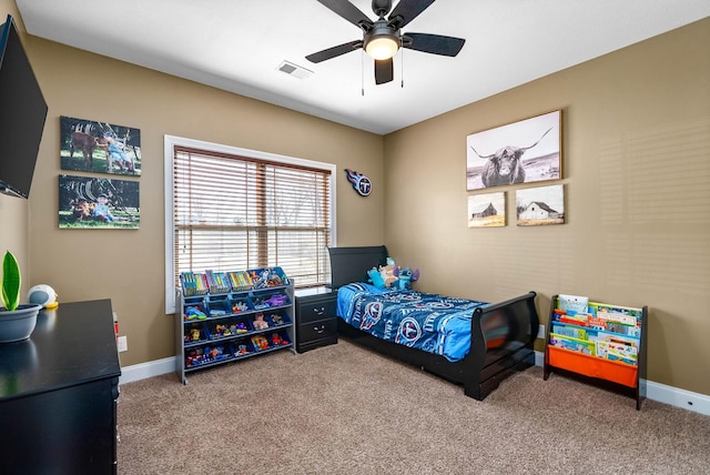 bedroom with carpet floors, visible vents, ceiling fan, and baseboards