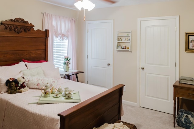 bedroom with light colored carpet