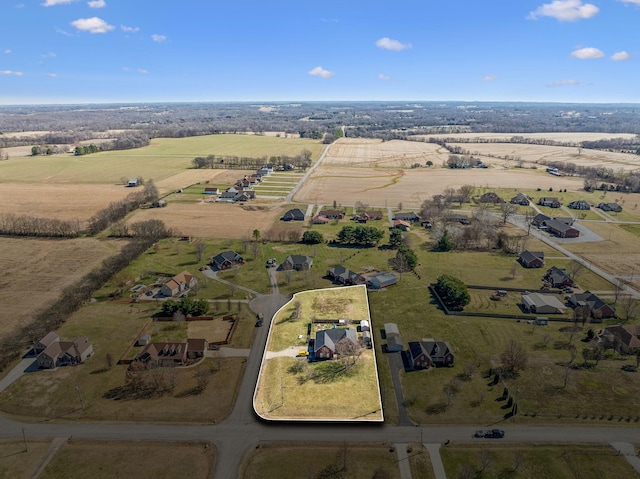 birds eye view of property featuring a rural view