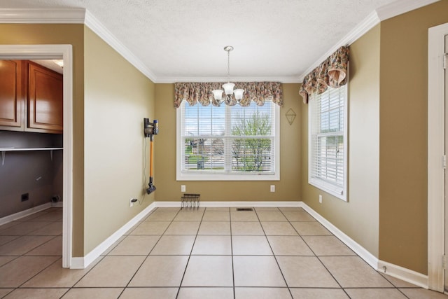 unfurnished dining area featuring an inviting chandelier, a textured ceiling, light tile patterned flooring, and crown molding