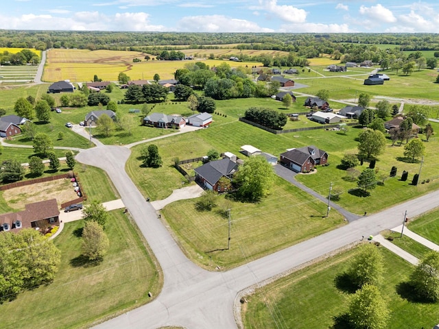 birds eye view of property featuring a rural view