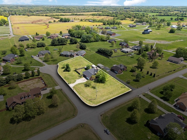 birds eye view of property featuring a rural view