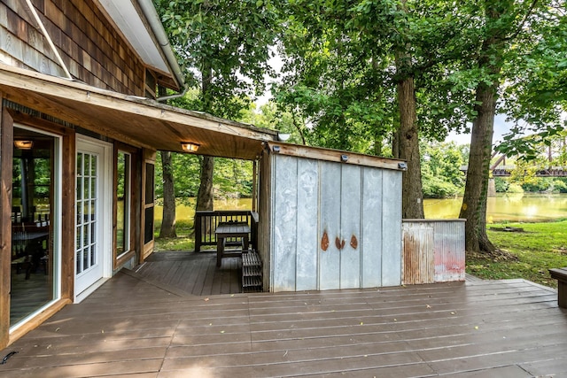 deck featuring a water view