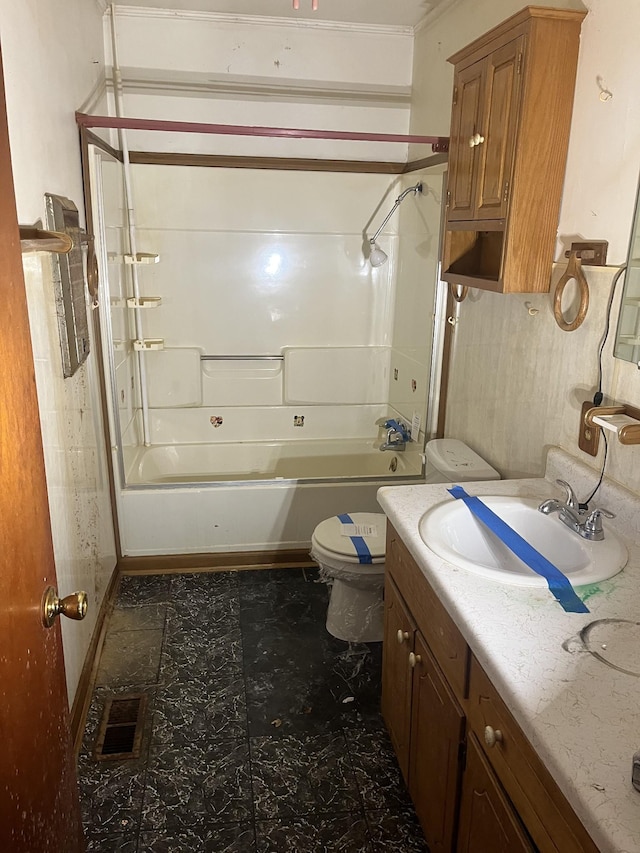 bathroom featuring  shower combination, toilet, and vanity