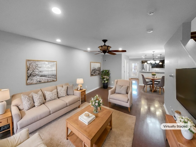 living room featuring recessed lighting, ceiling fan, baseboards, and wood finished floors