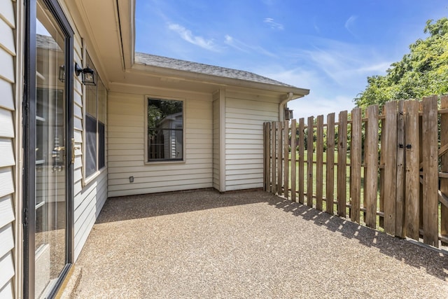 view of patio with fence