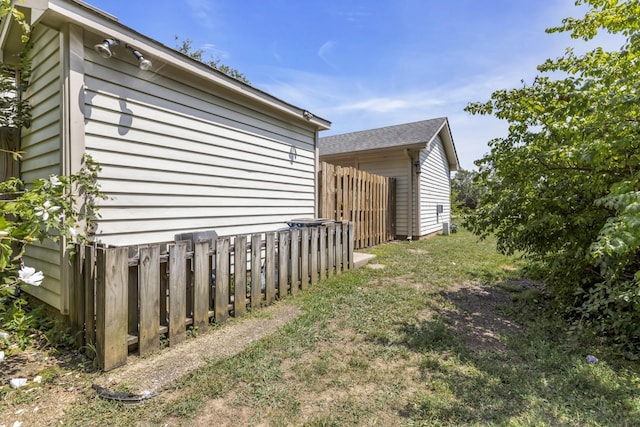 view of property exterior featuring fence