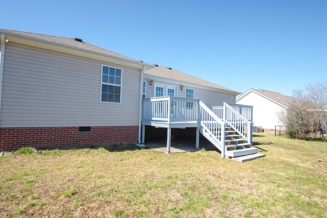 back of property with stairway, crawl space, a yard, and a deck