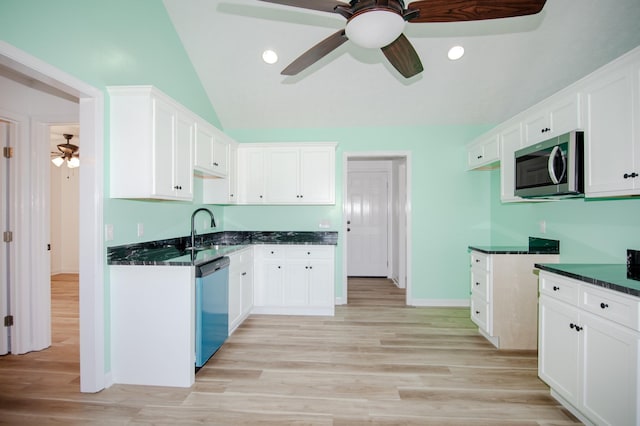 kitchen with white cabinets, dishwashing machine, stainless steel microwave, light wood-style floors, and a sink