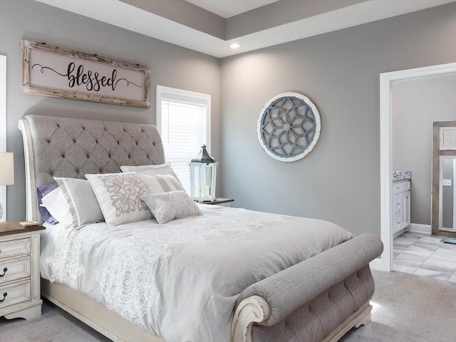 bedroom featuring recessed lighting, baseboards, and light colored carpet