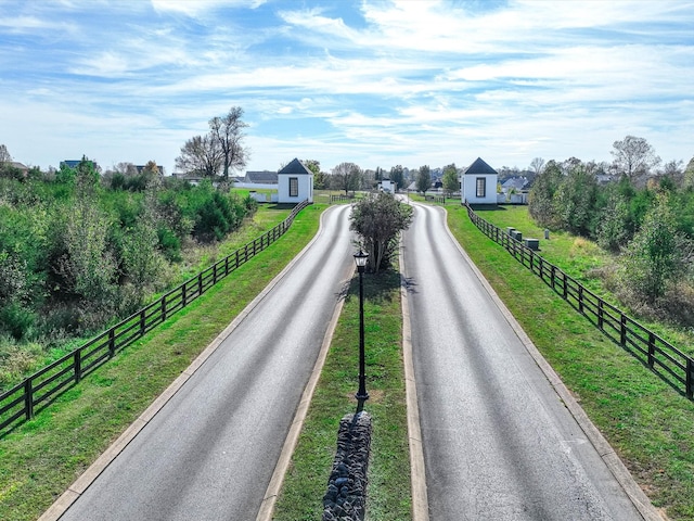 view of street with curbs