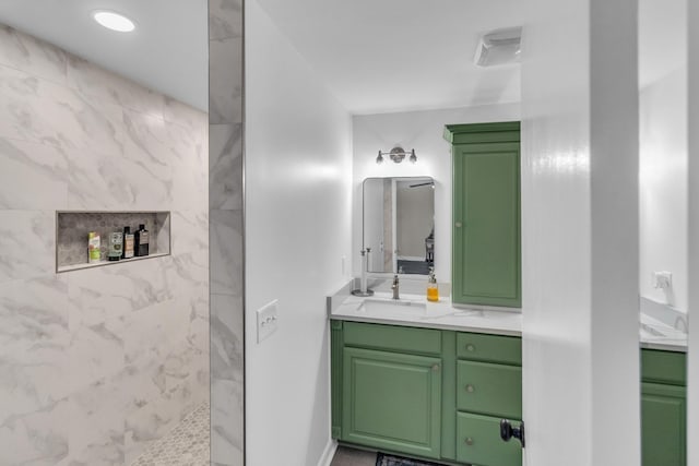 bathroom featuring vanity and walk in shower