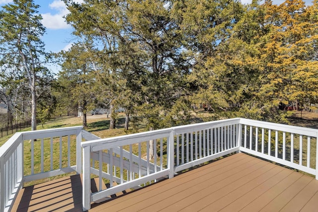 wooden terrace with a yard