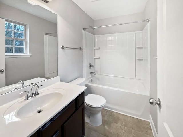 bathroom featuring toilet, bathing tub / shower combination, and vanity