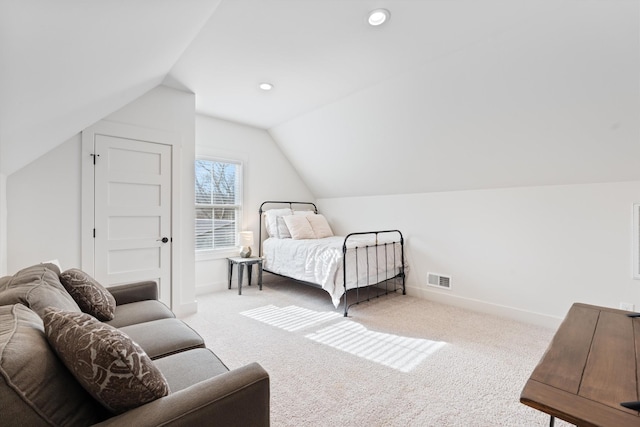 carpeted bedroom with visible vents, baseboards, vaulted ceiling, and recessed lighting