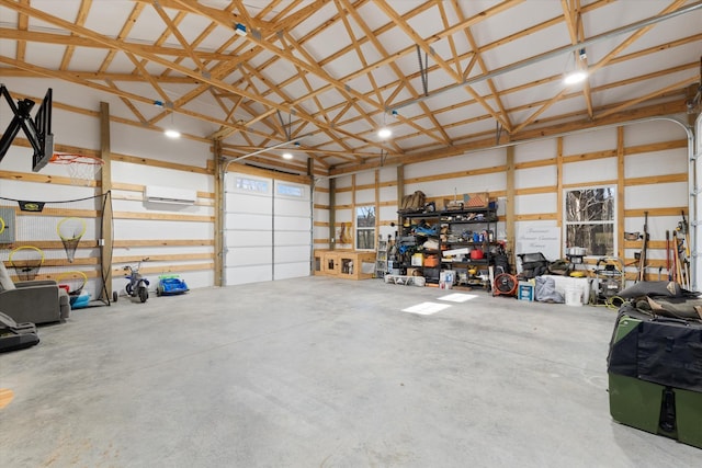 garage featuring a wall mounted AC and metal wall