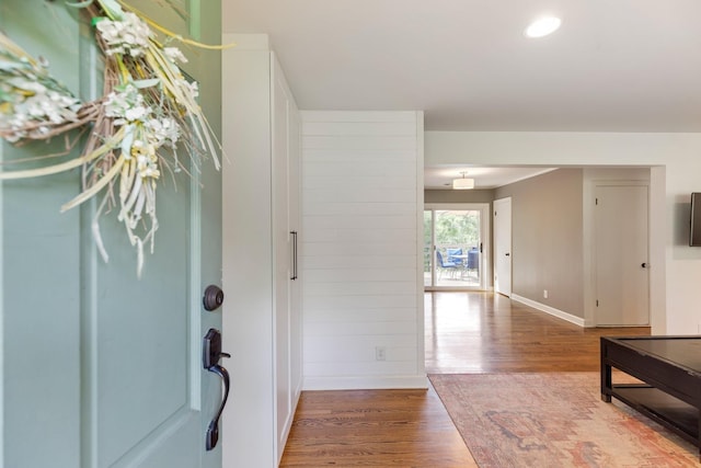 foyer entrance featuring recessed lighting, baseboards, and wood finished floors