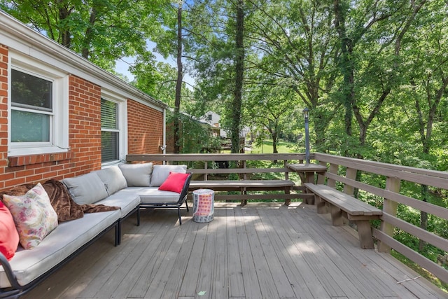 wooden deck with outdoor lounge area