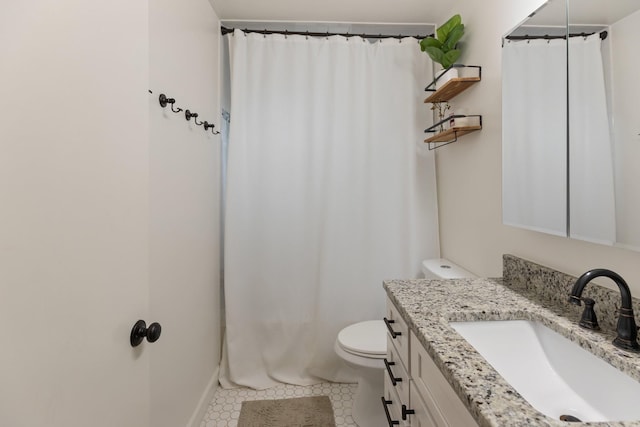 full bathroom with toilet, curtained shower, tile patterned floors, and vanity