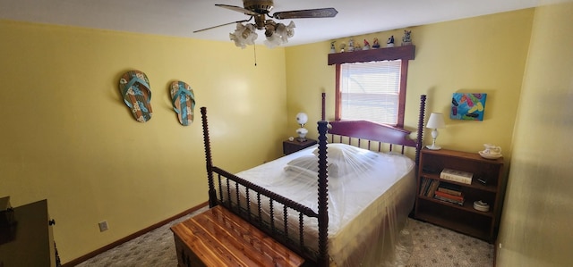 bedroom with ceiling fan, carpet, and baseboards