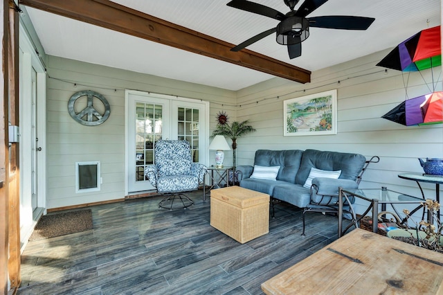 wooden terrace featuring outdoor lounge area, a ceiling fan, and french doors