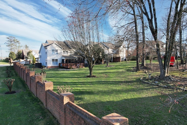 view of yard with fence