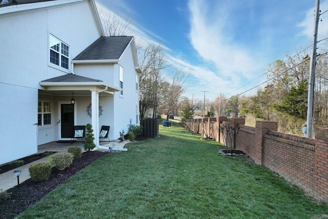 view of yard featuring fence