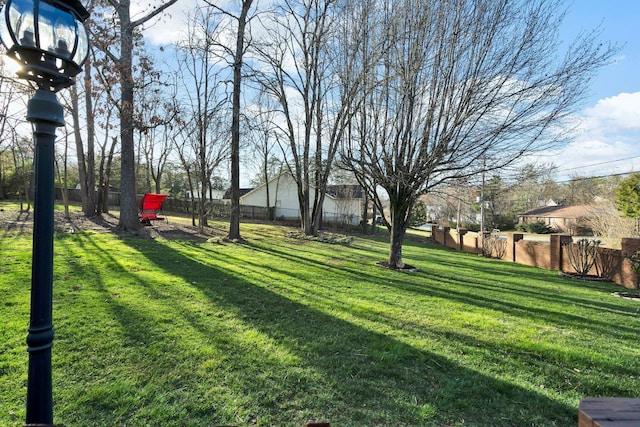 view of yard featuring fence