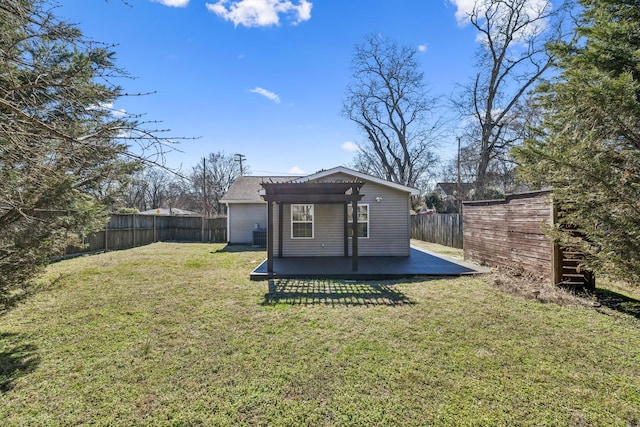 view of outbuilding featuring an outdoor structure, a fenced backyard, and a pergola