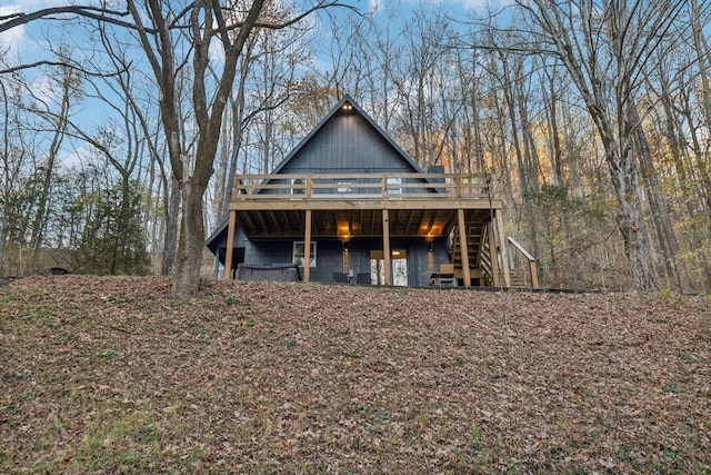 view of front of house featuring a deck and stairs