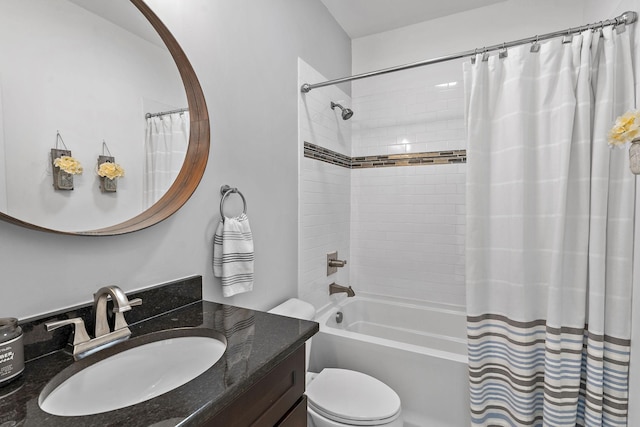 bathroom with toilet, vanity, and shower / tub combo with curtain